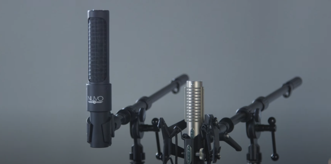 Close-up of a ribbon microphone on a gray background