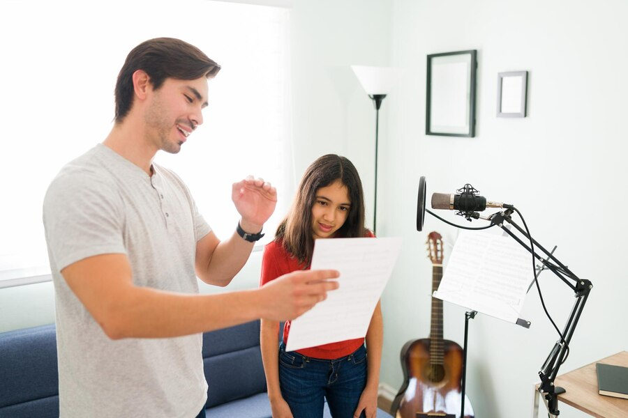 Man teaching child how to sing