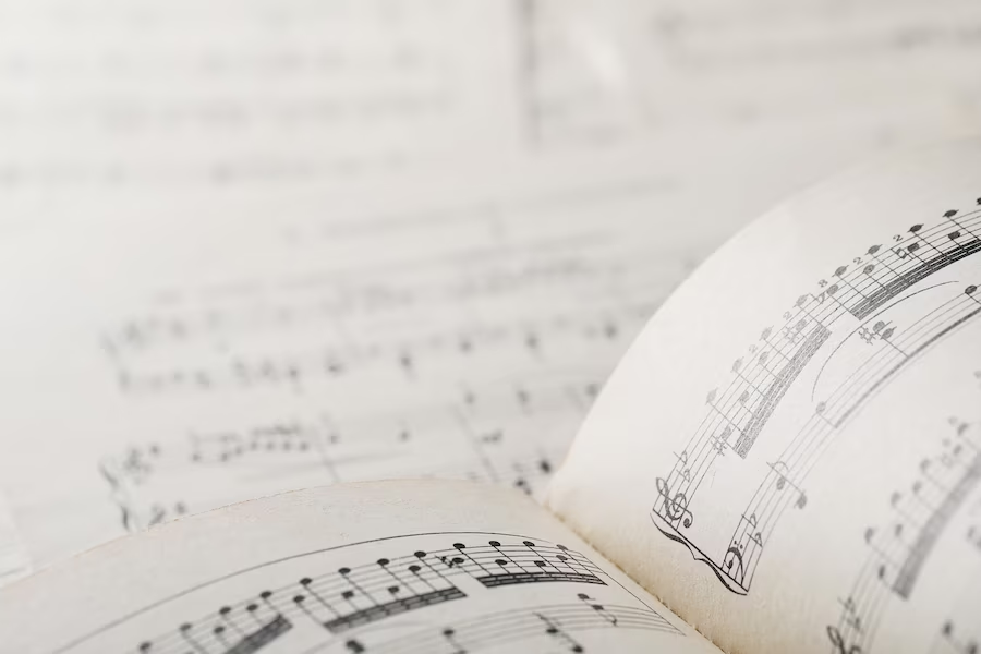 Image of books featuring music notes