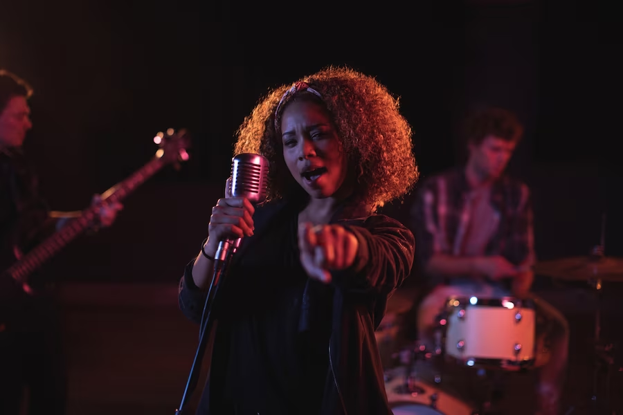 Woman singing with hand gestures